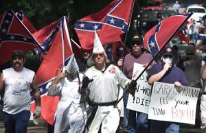 Ku Klux Klan wave the flag of their heritage