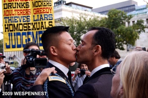 Sharing a kiss in front of bigoted homophobes