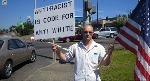 Tyler Cole “protesting the racist media” on the corner of SE McLoughlin Blvd and SE Concord Rd, Milwaukie, OR.